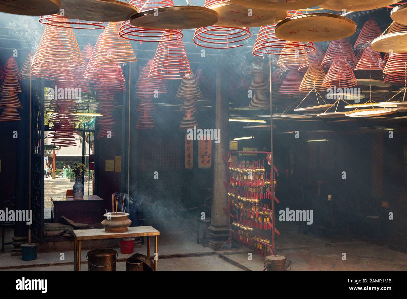 Chines culture incense sticks burning to produce a smoky atmosphere