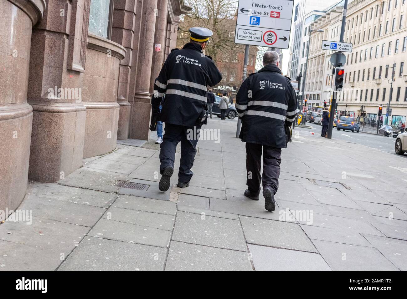 Traffic wardens patrolling Lime Street, Liverpool Stock Photo