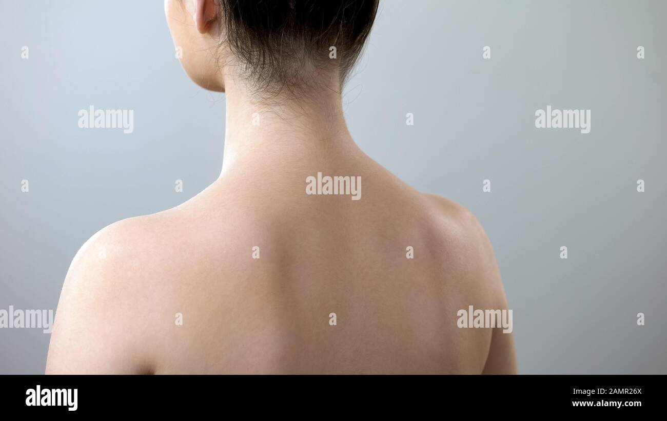 Healthy female neck and back, lady visiting spine doctor in clinic, healthcare Stock Photo