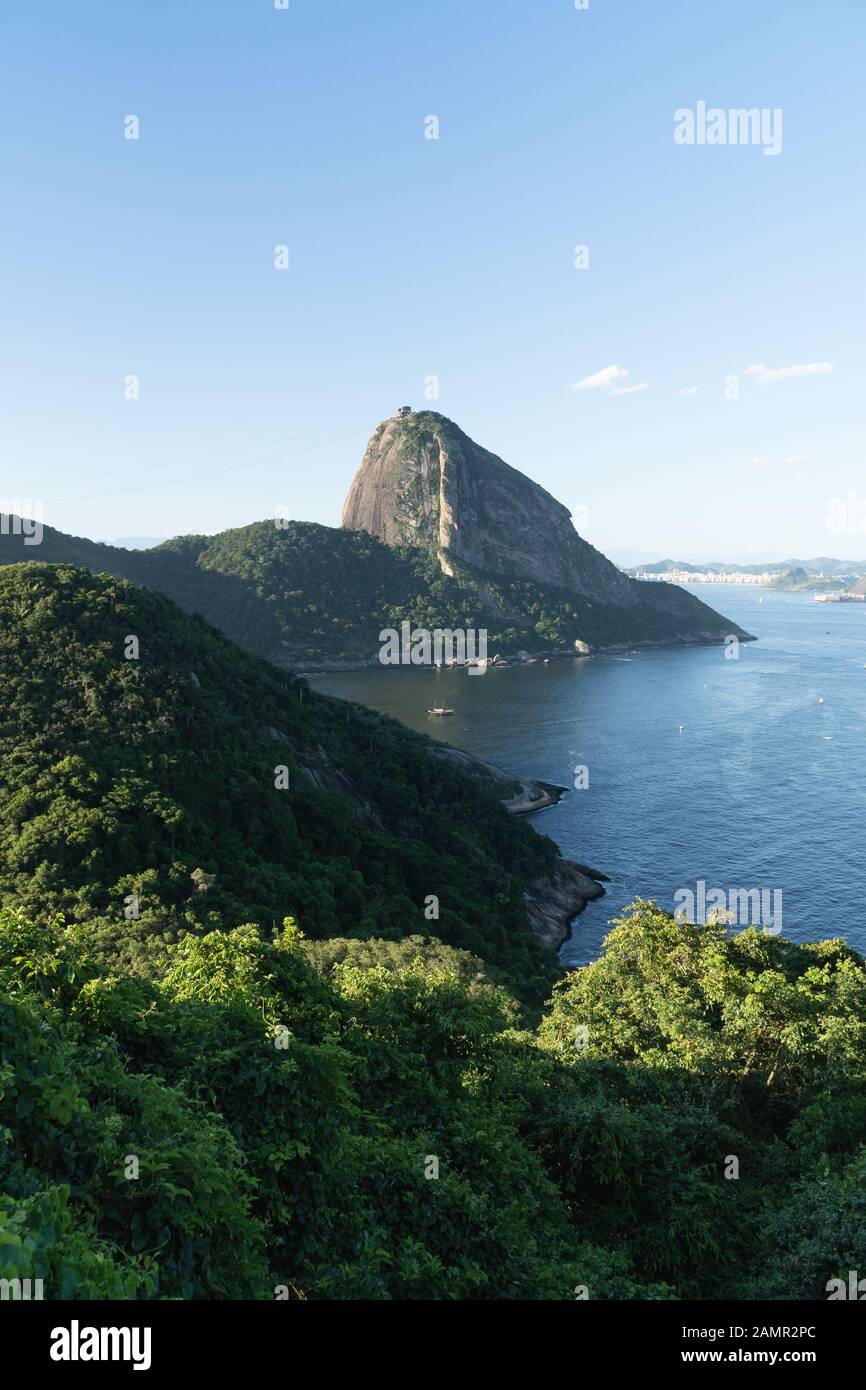 Sunny day view from Forte Duque de Caxias in Leme overlooking Sugarloaf Mountain in Rio de Janeiro. Stock Photo