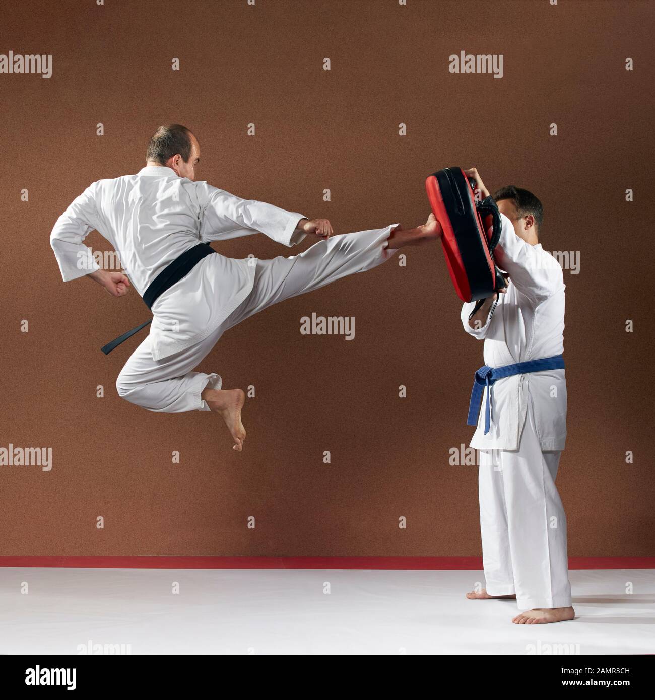 A Man, In A Black Kimono Is Practicing Martial Arts Technique With A Long  Bamboo Fighting Stick. Stock Photo, Picture and Royalty Free Image. Image  91980191.