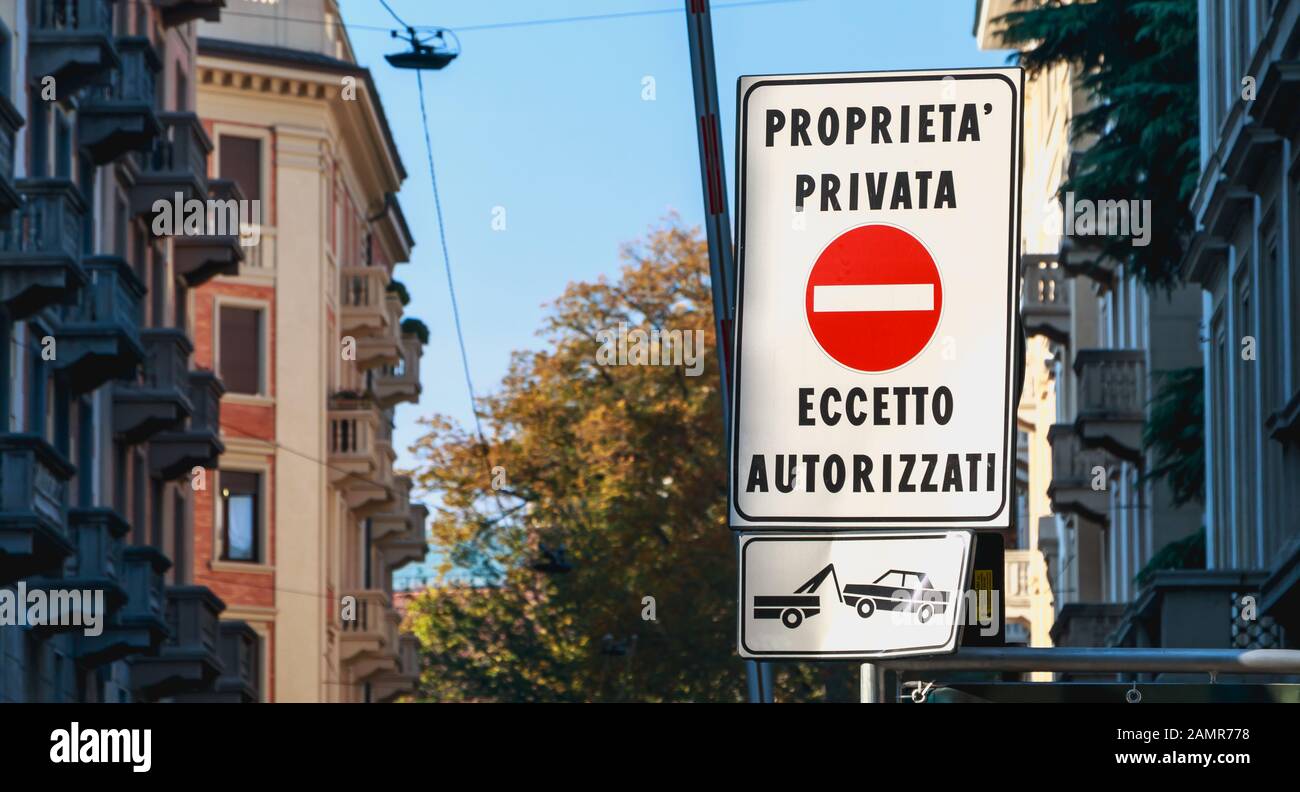 Milan, Italy - November 3, 2017: Road sign in Italian Private property access with authorization (prorieta privata eccetto autorizzati) in the city ce Stock Photo