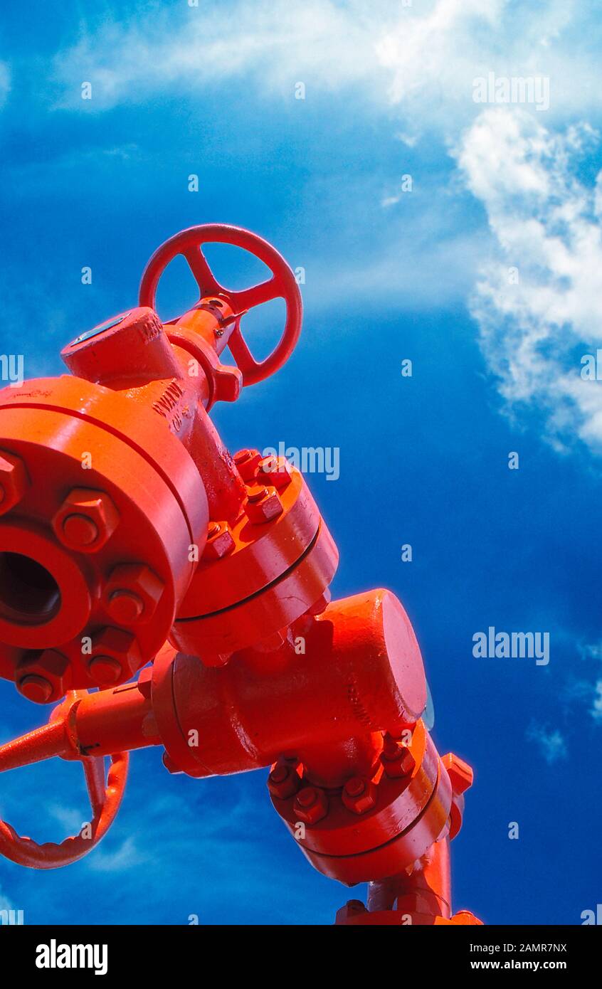 Manual shut-off valve on oil well. Oil well wellhead equipment Stock Photo