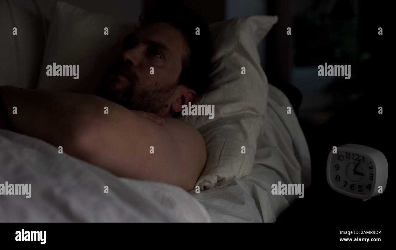 Nervous man bed hi-res stock photography and images - Alamy