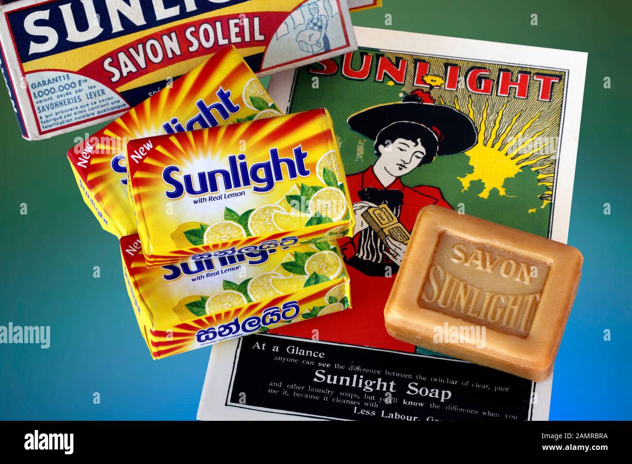 Samples of old and new bars of Sunlight soap and an old marketing poster for the product. First produced by Lever Brothers at Port Sunlight, Cheshire. Stock Photo