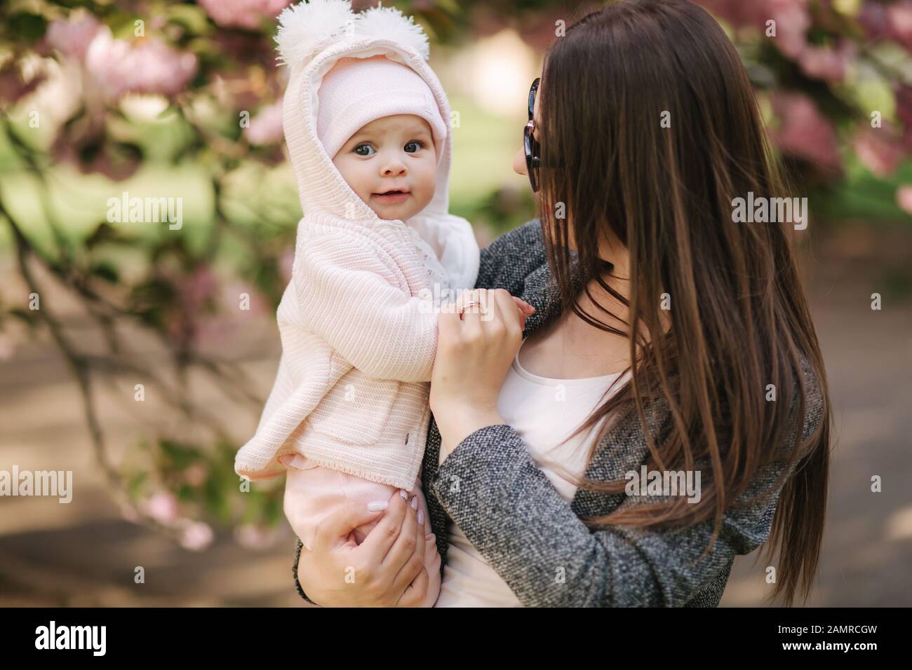 Portrait of mother and her little baby girl. Beautiful mom and ...