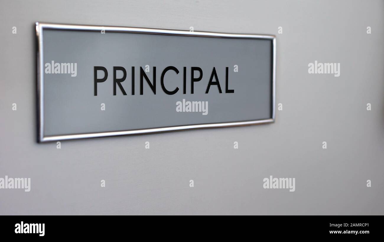 Principal office door desk closeup, visit to school director, education system Stock Photo