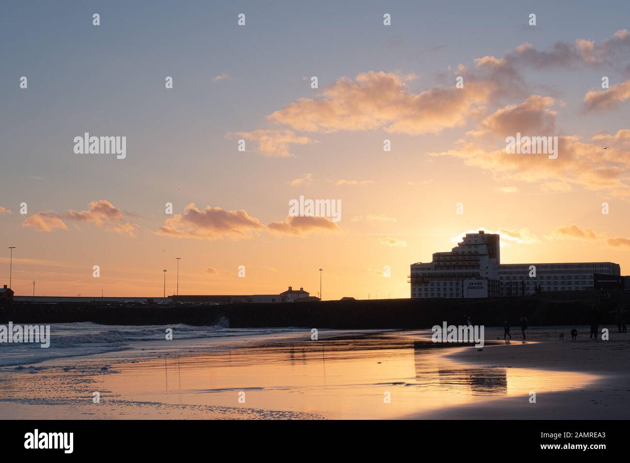 Sunset On The Beach With The Burstin Hotel In The Bacground sunset-on-the-beach-with-the-burstin-hotel-in-the-bacground