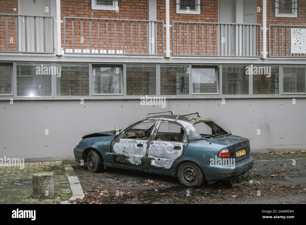 Strasbourg, France - Jan 1, 2020: Daewoo burnt car by Vandals in Strasbourg, France during the start of 2020 by setting countless vehicles on fire in front of HLM poor neighborhood Stock Photo