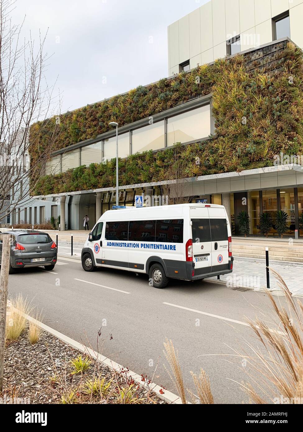 Strasbourg, France - Dec 14, 2018: Side view of Fiat Ducato white van with Administration penitentiaire en France translated Prison administration parked in front of NHC hospital Stock Photo