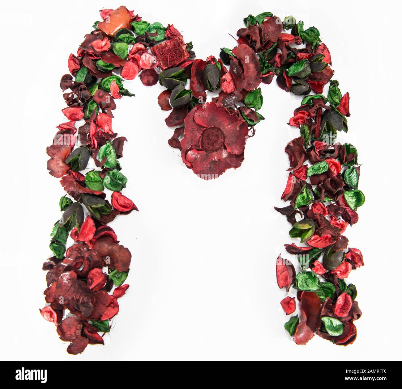 Latin alphabet letter made from dry rose flowers Stock Photo Alamy