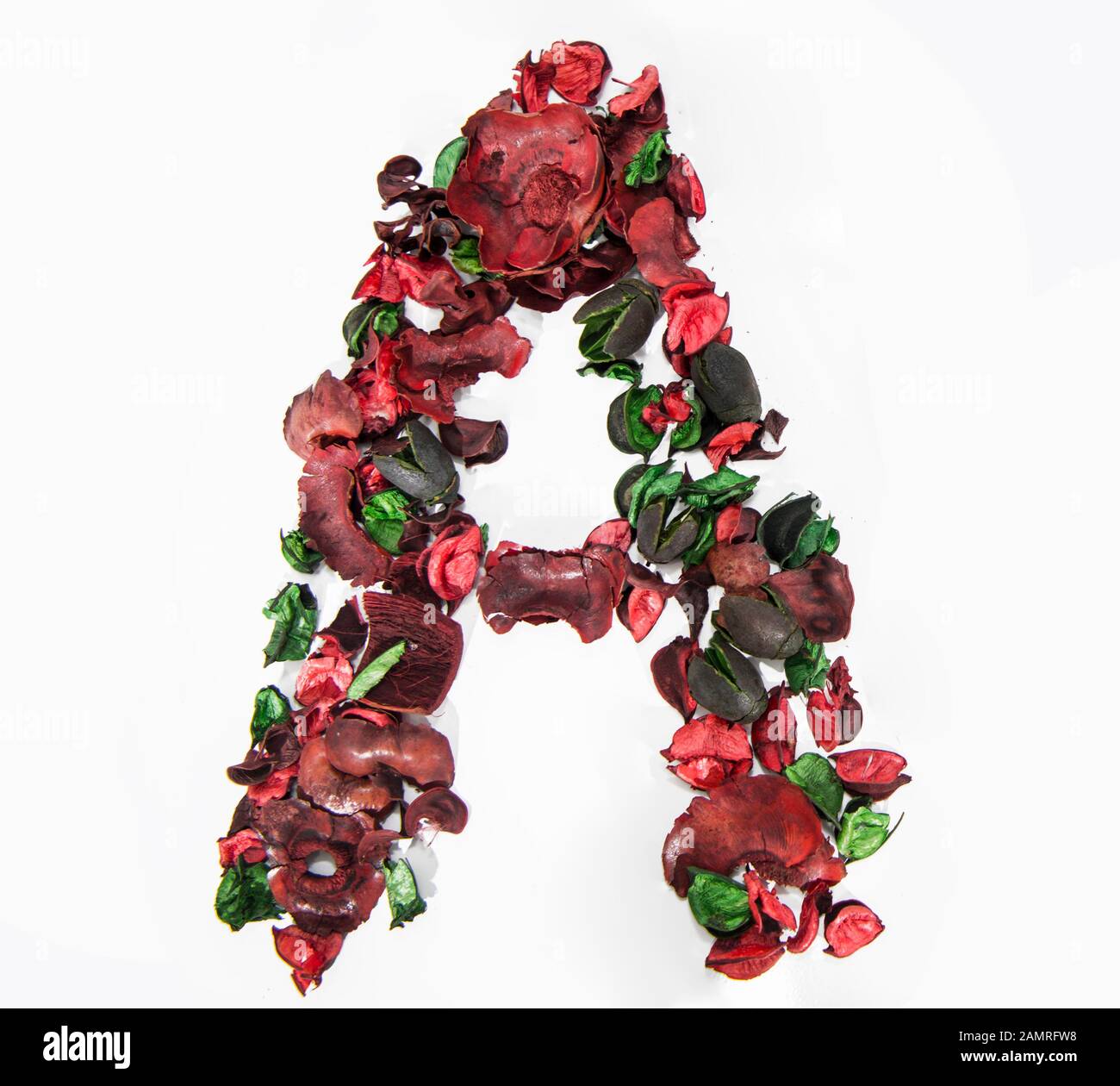 Latin alphabet letter made from dry rose flowers Stock Photo Alamy