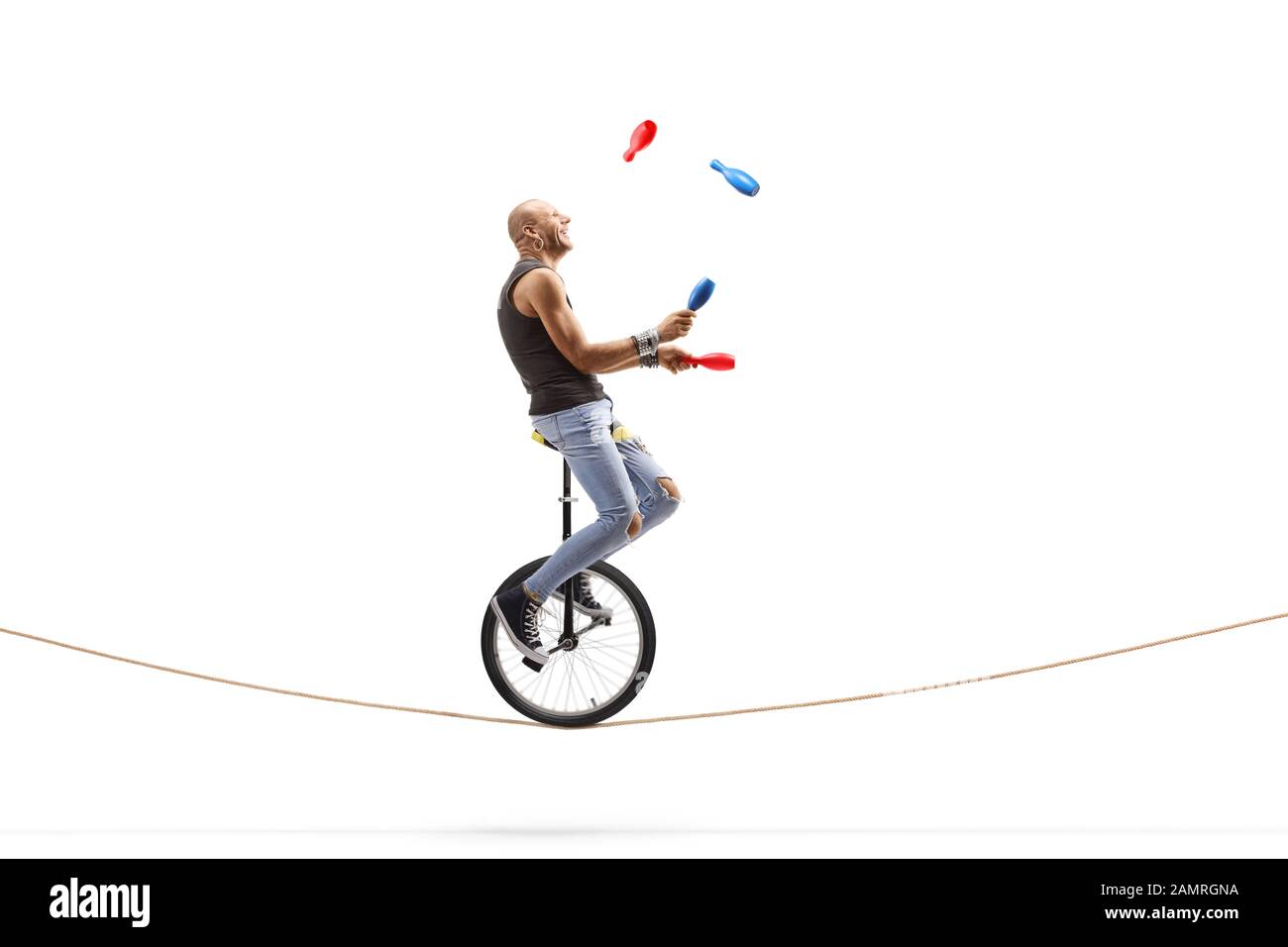 Juggling on a unicycle Cut Out Stock Images & Pictures Alamy
