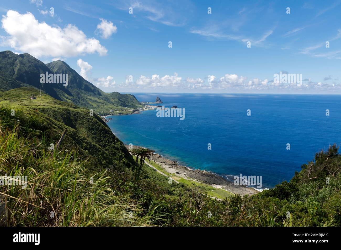 View from hill top of coast line and sea, mountains and harbour at Orchid Island (Lanyu), Taitung County, Lanyu Township, Taiwan Stock Photo