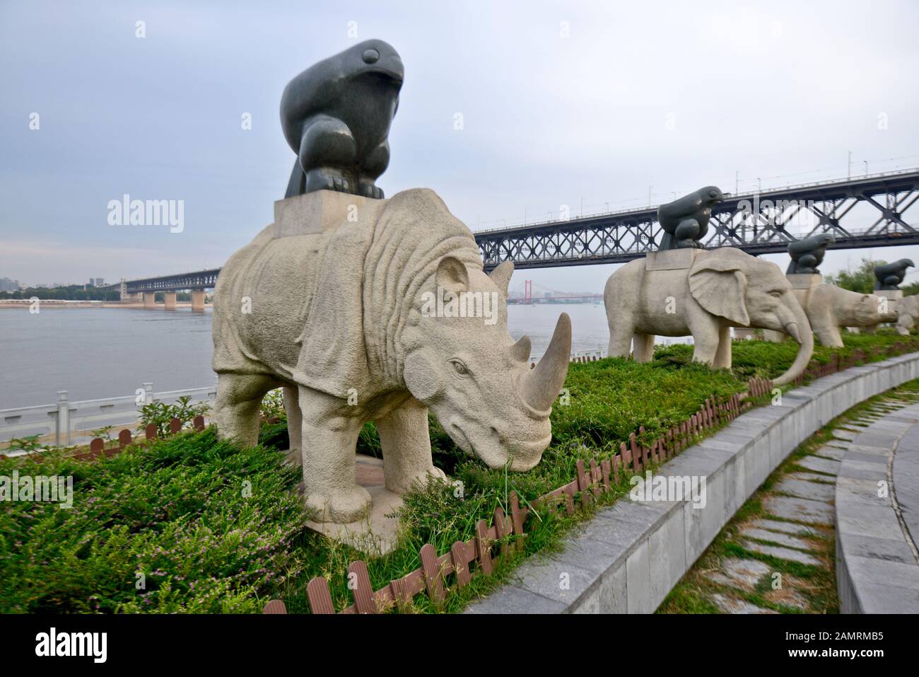 Animal figures holding an Eagle tripod. Dayu Myth Park. Wuhan, China Stock Photo