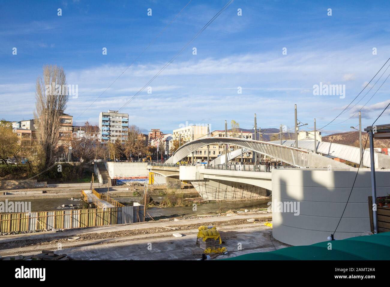 MITROVICA, KOSOVO - NOVEMBER 13, 2016: New bridge of Mitrovica, also called Ibar most na drinu, symbol of the separation between Albanians and Serbs i Stock Photo