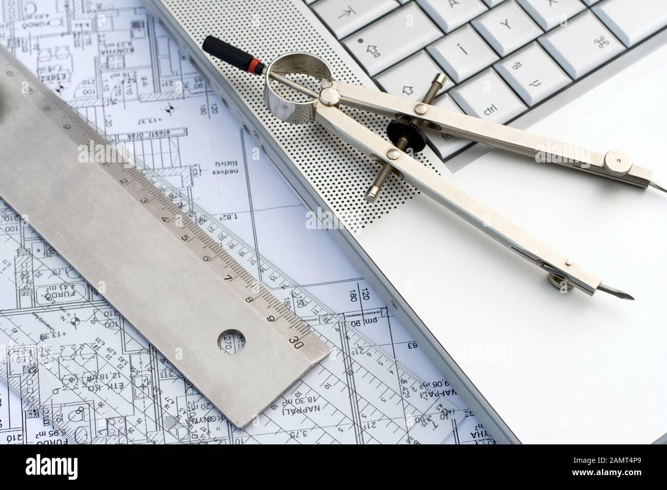 Laptop Ng Ruler Laptop, rulers and pens on a floor map Stock Photo - Alamy