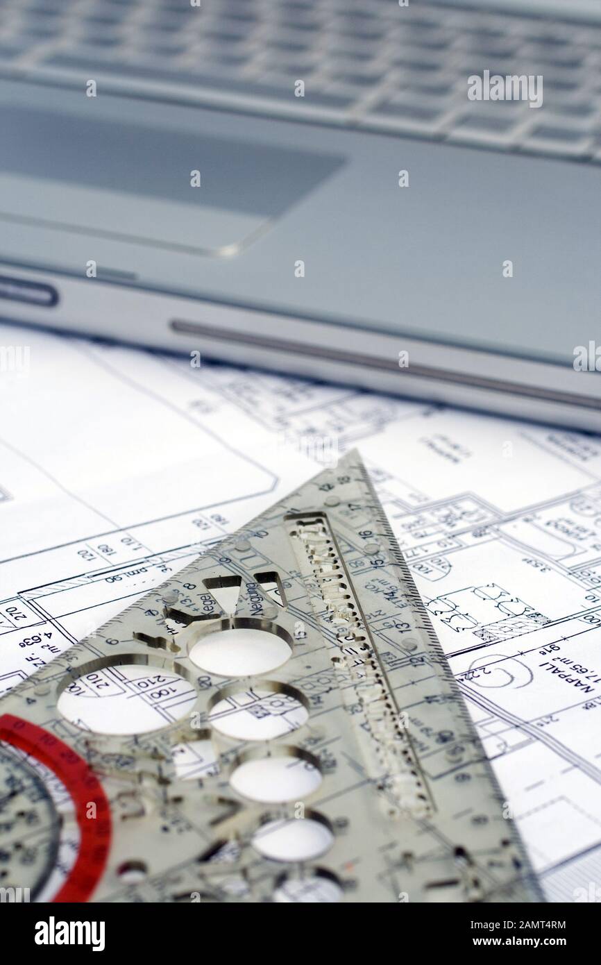 Laptop Ng Ruler Laptop, rulers and pens on a floor map Stock Photo - Alamy