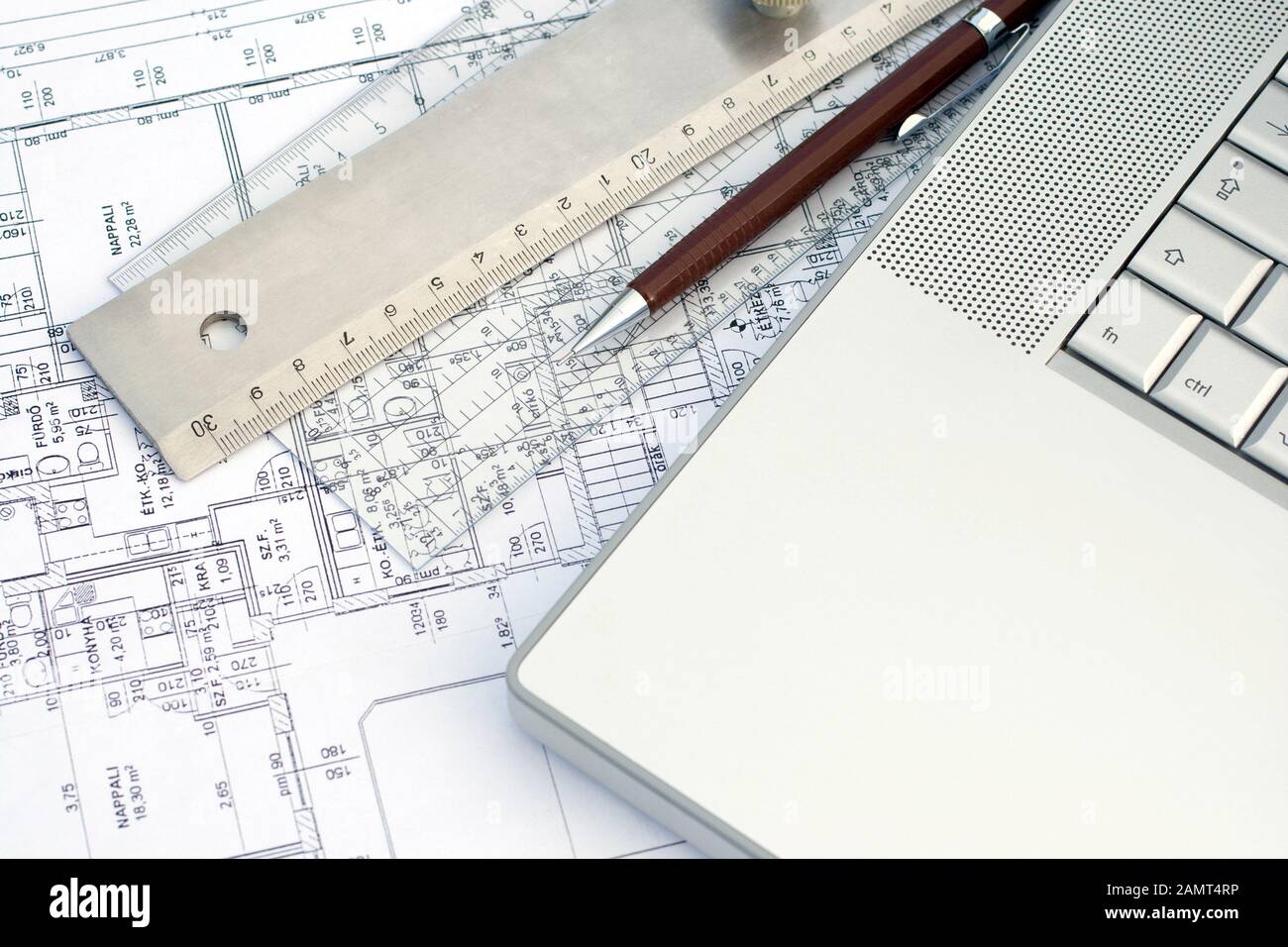 Laptop Ng Ruler Laptop, rulers and pens on a floor map Stock Photo - Alamy