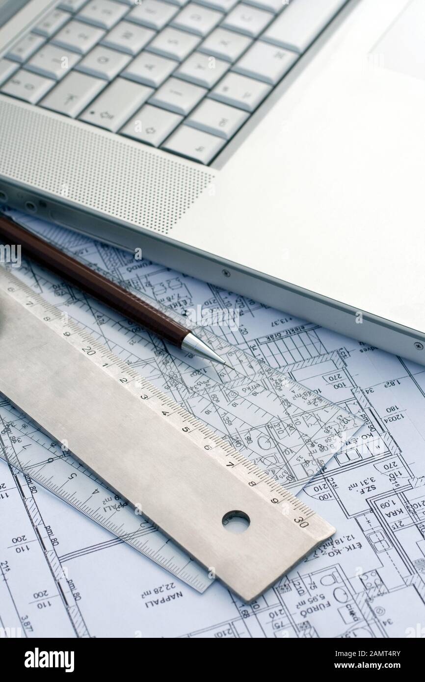 Laptop Ng Ruler Laptop, rulers and pens on a floor map Stock Photo - Alamy