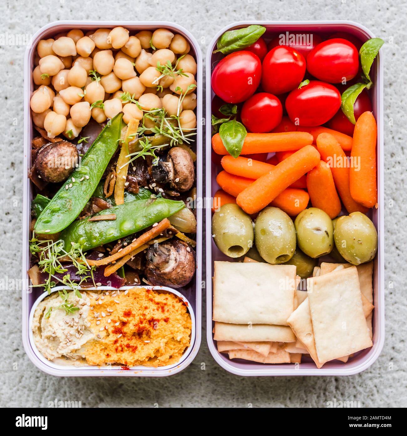 Vegetable and humus lunch boxes Stock Photo