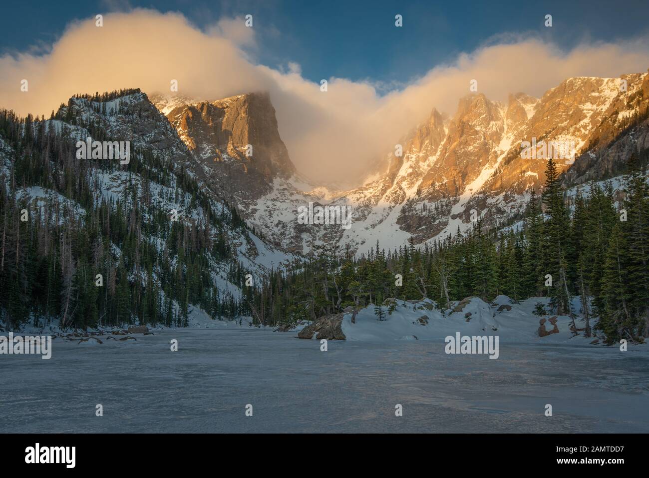 Frozen Dream Lake and Hallett Peak at Sunrise, rocky Mountain National Park, Colorado, USA Stock Photo