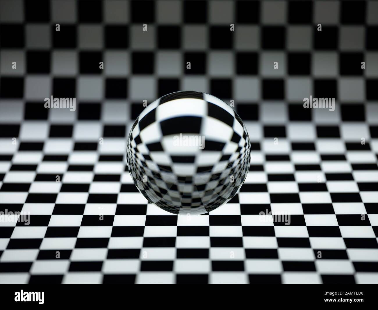Crystal ball on a checked background Stock Photo