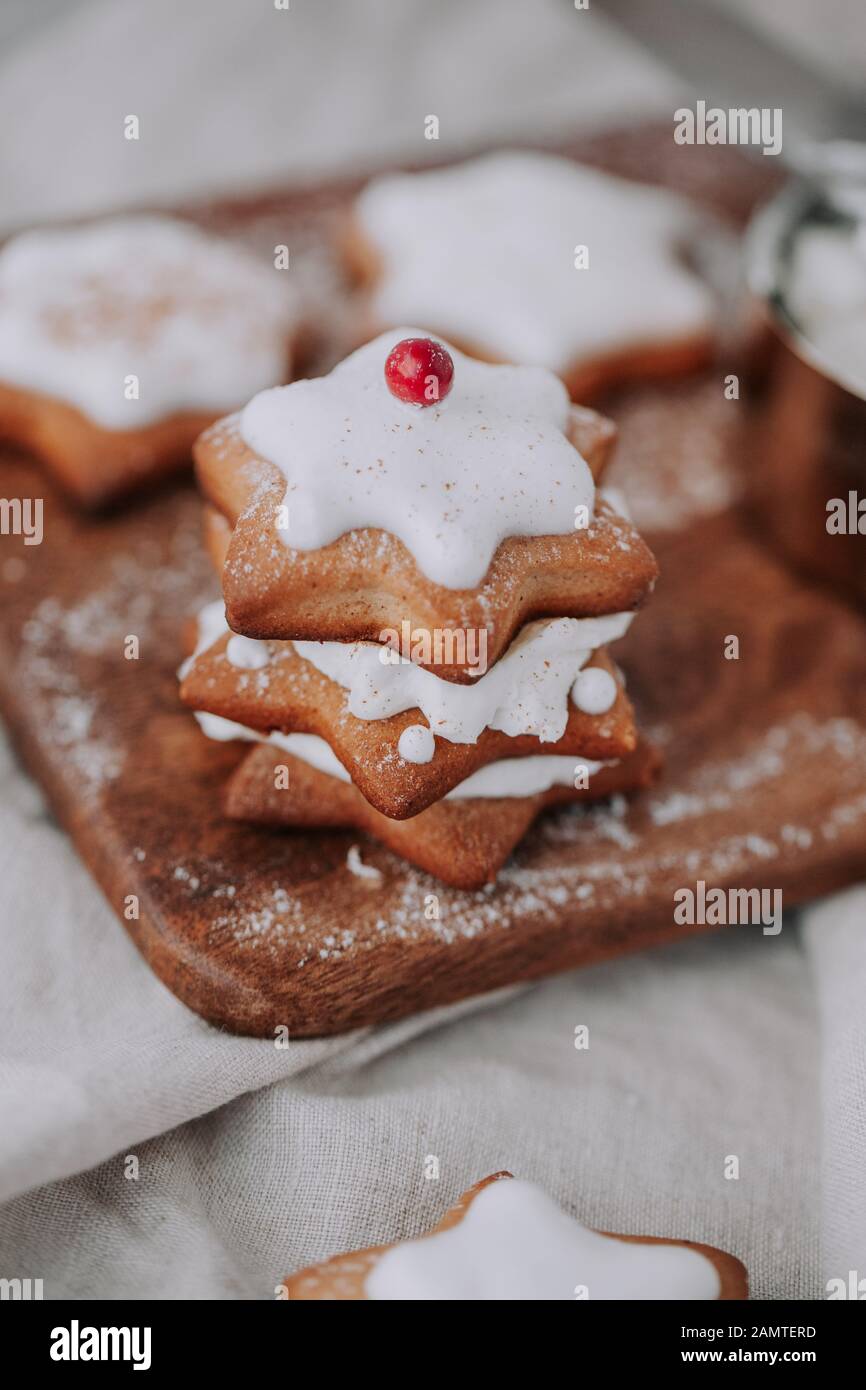 Star shaped gingerbread cookies with icing Stock Photo