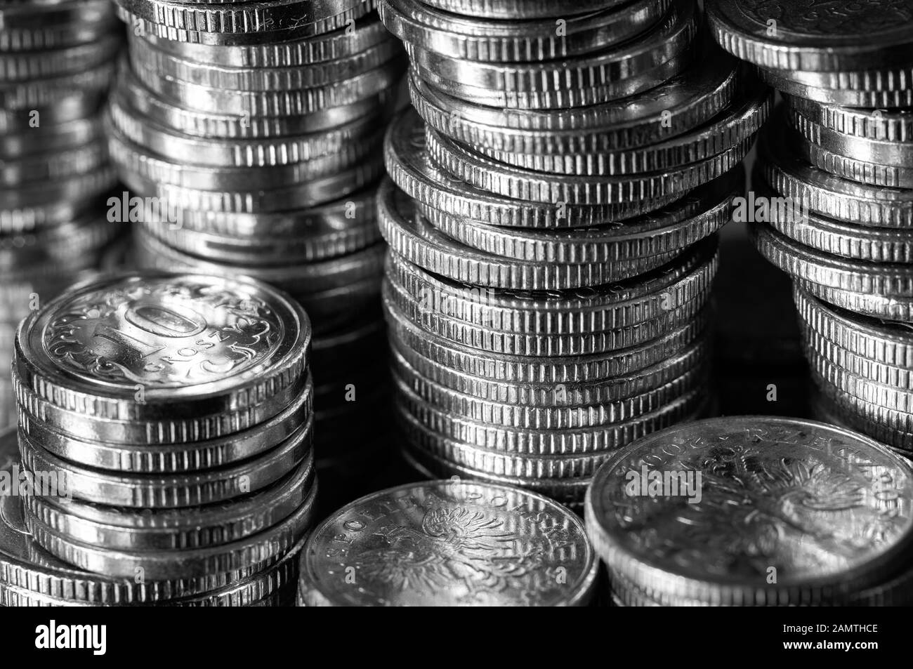 Glittering coins stacked, polish currency, growth and increase icon. Stock Photo