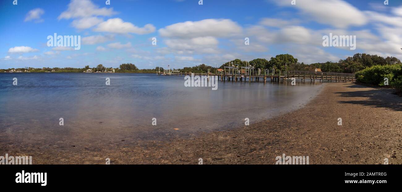 Clouds and Blue sky over Jones Bayou pier on Anna Maria island, Florida