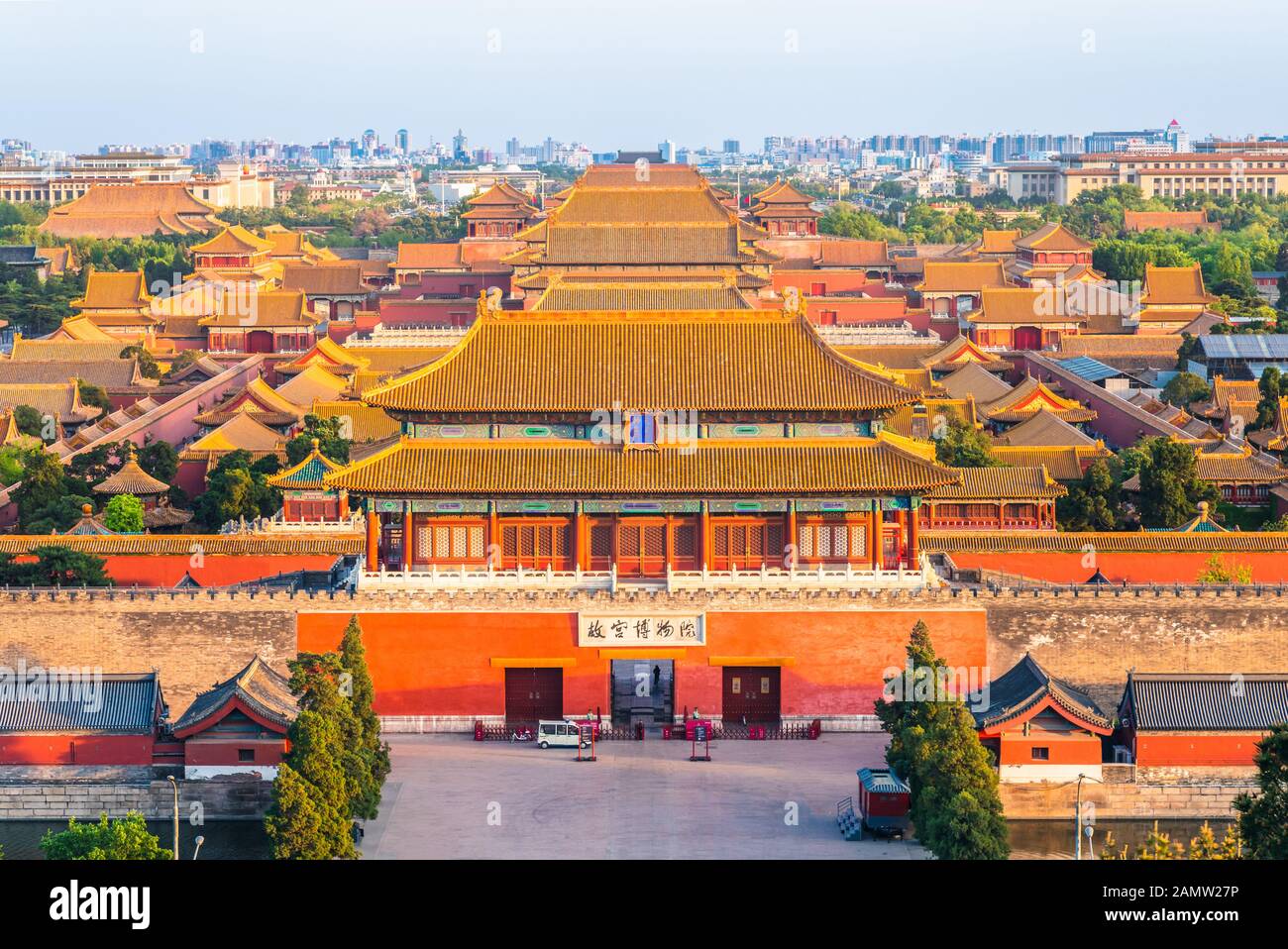 The Forbidden City viewed from Jingshan Hill. The chinese text on the tablet reads "Palace Museum" and "divine might gate" Stock Photo