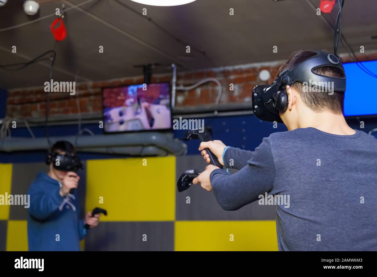 Two guys playing video games hi-res stock photography and images - Alamy