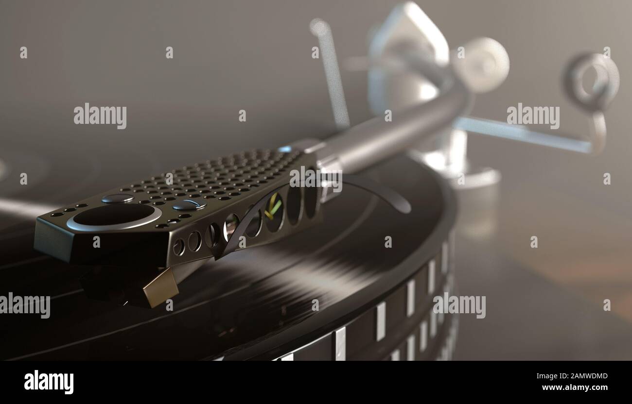 A vintage unbranded turntable playing a vinyl record on a moody backlit ...