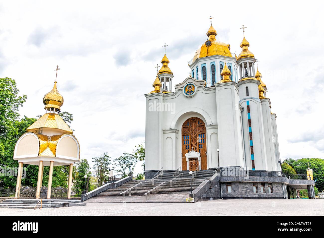 Rivne, Ukraine - July 3, 2018: Soborna and Lypnya street in Rovno city town in western Ukraine, outdoor park in summer, St Basil Cathedral UOC-KP Stock Photo
