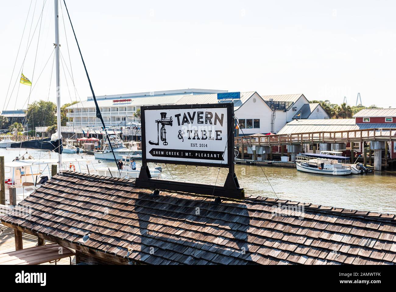 Mount Pleasant, USA - May 11, 2018: County of Charleston South Carolina area with restaurants on bay and sign for tavern on Shem Creek Stock Photo