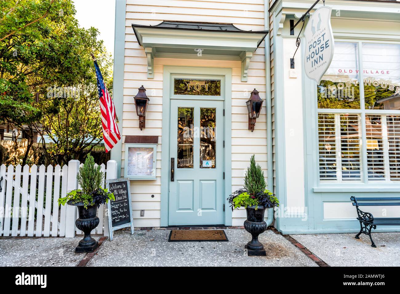 Mount Pleasant, USA - May 11, 2018: Charleston South Carolina with old street road and post house inn hotel small building entrance Stock Photo