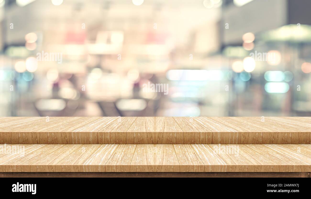 Empty step wood table top ( food stand ) with blur customer dining at cafe restaurant background bokeh light,Mock up for display or montage of product Stock Photo