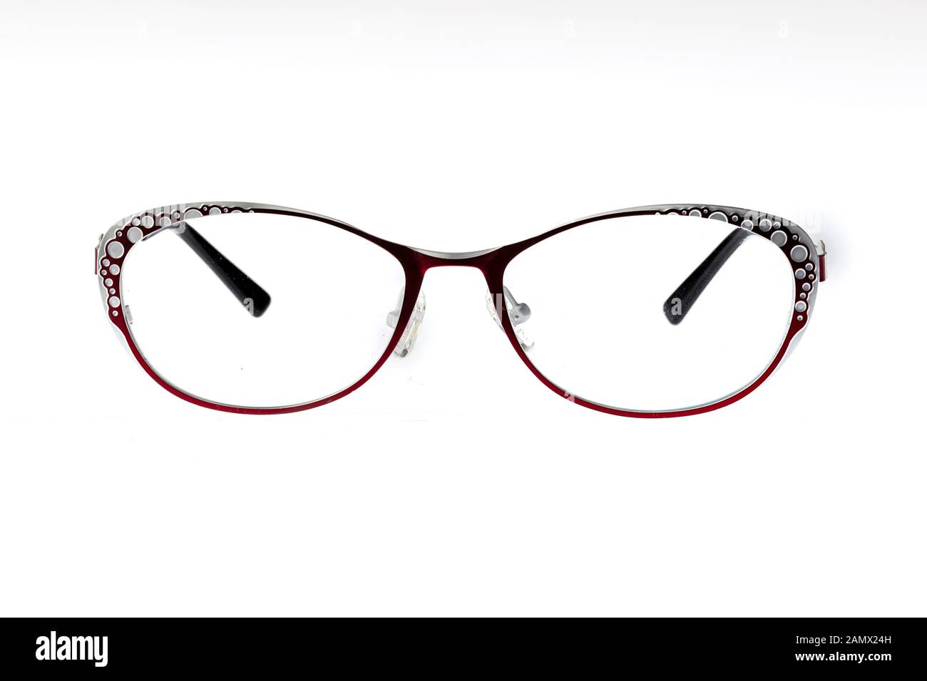 Eyeglasses red framed on white background with soft focus. Stock Photo