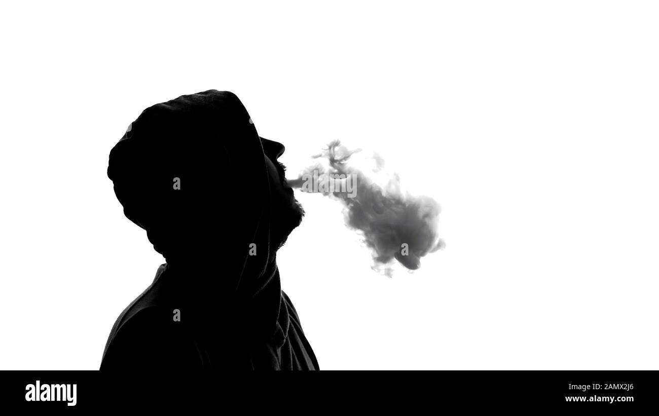 Smoker in silhouette hi-res stock photography and images - Alamy