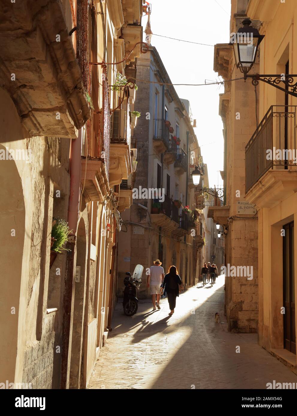 Small narrow street in the old town Ortygia, Syracuse, Sicily, Italy, Stock Photo