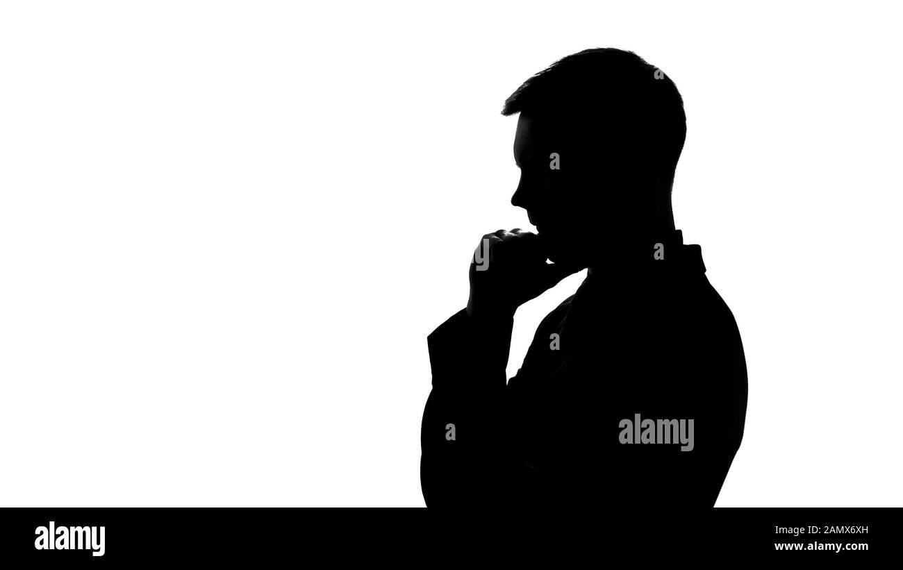 Serious man silhouette thinking over creative idea, startup, business planning Stock Photo