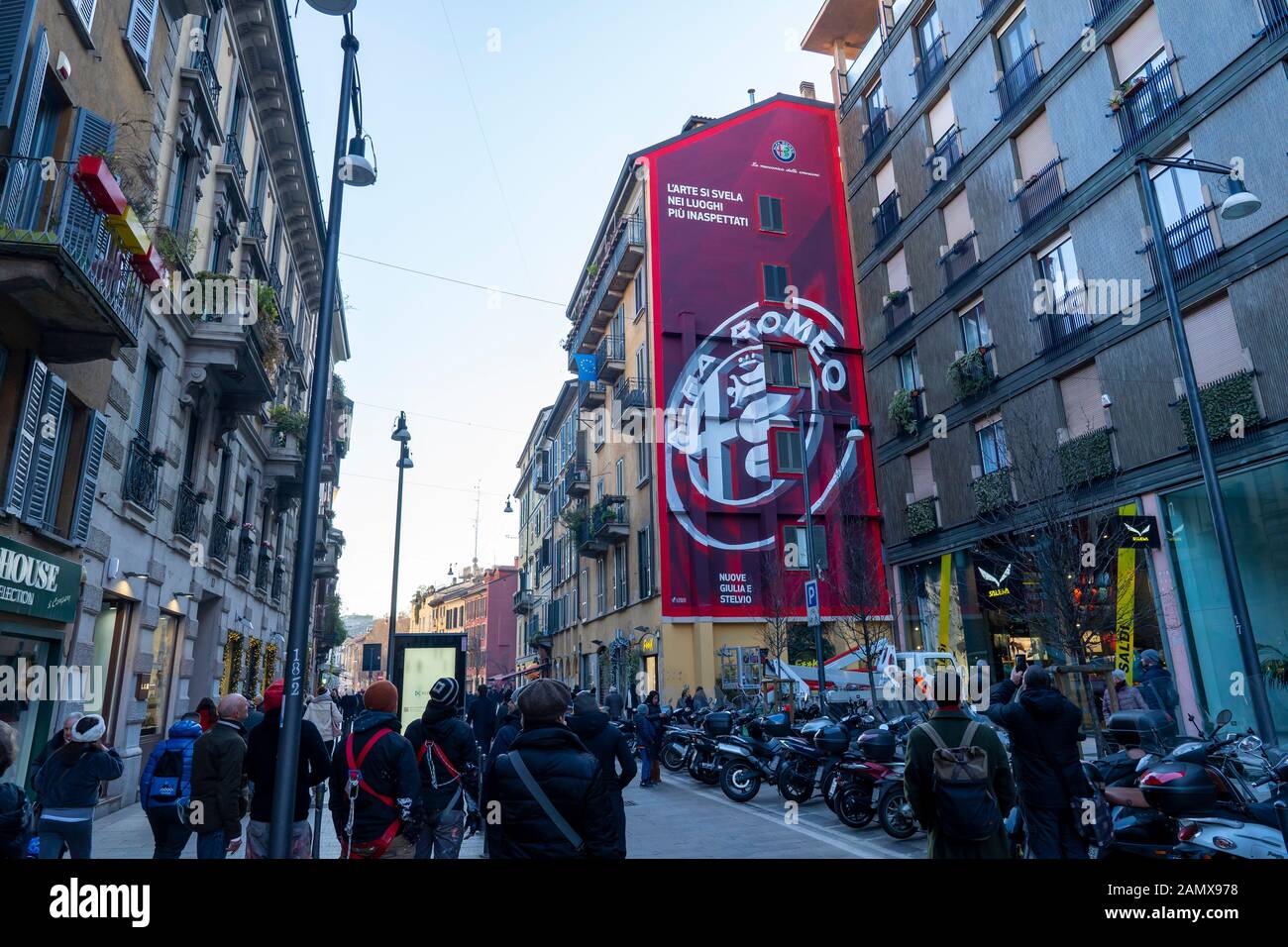Milan, Italy: Giant advertising of Alfa Romeo cars on building wall in Corso Garibaldi street, Milan downtown. Stock Photo