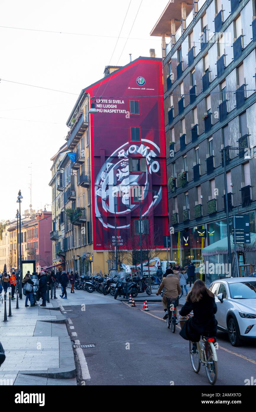 Milan, Italy: Giant advertising of Alfa Romeo cars on building wall in Corso Garibaldi street, Milan downtown. Stock Photo
