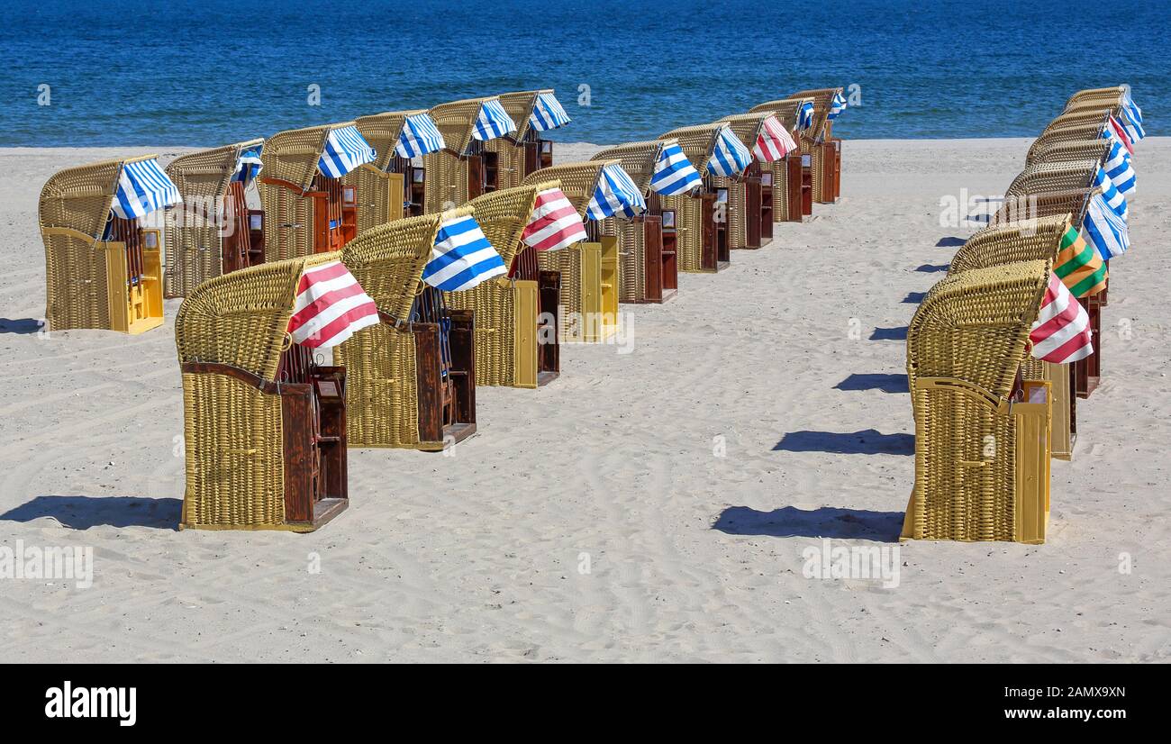 The spa beach is framed by the beach promenade and the Nordermole on the city side. Seven beach chair rentals with a total of around 1100 beach chairs. Stock Photo
