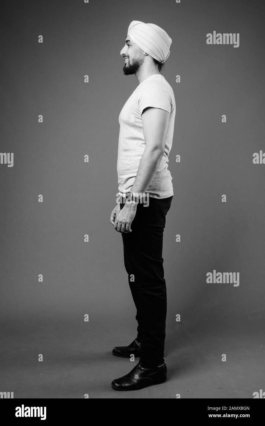 Indian young happy men side view Black and White Stock Photos & Images ...