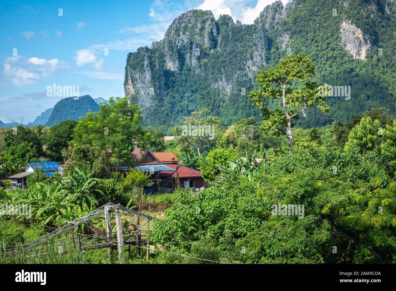 Village and mountain in Vang Vieng, Laos Southeast Asia. Stock Photo