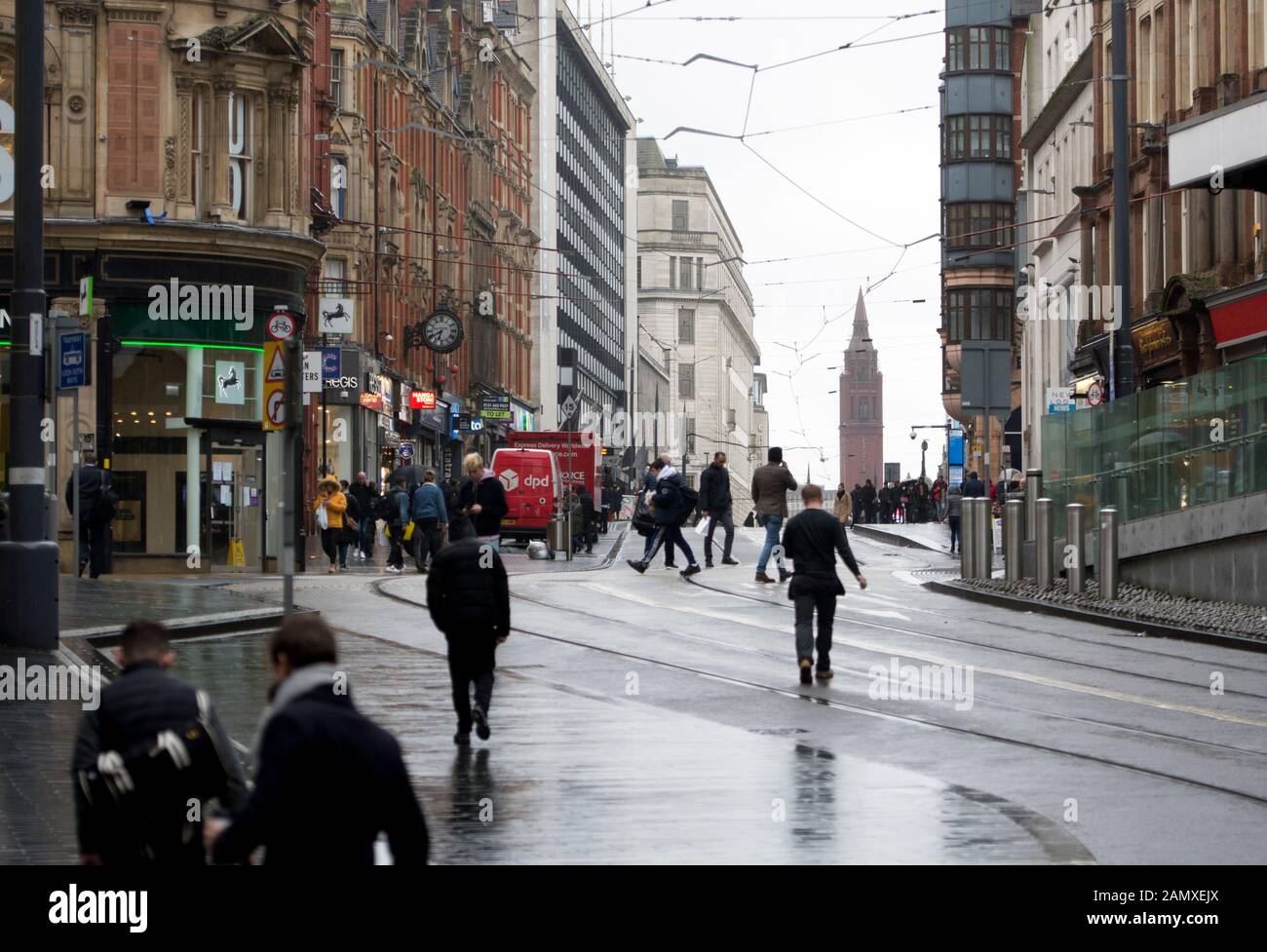 View towards Corporation Street in wet weather in winter, Birmingham city centre, UK Stock Photo