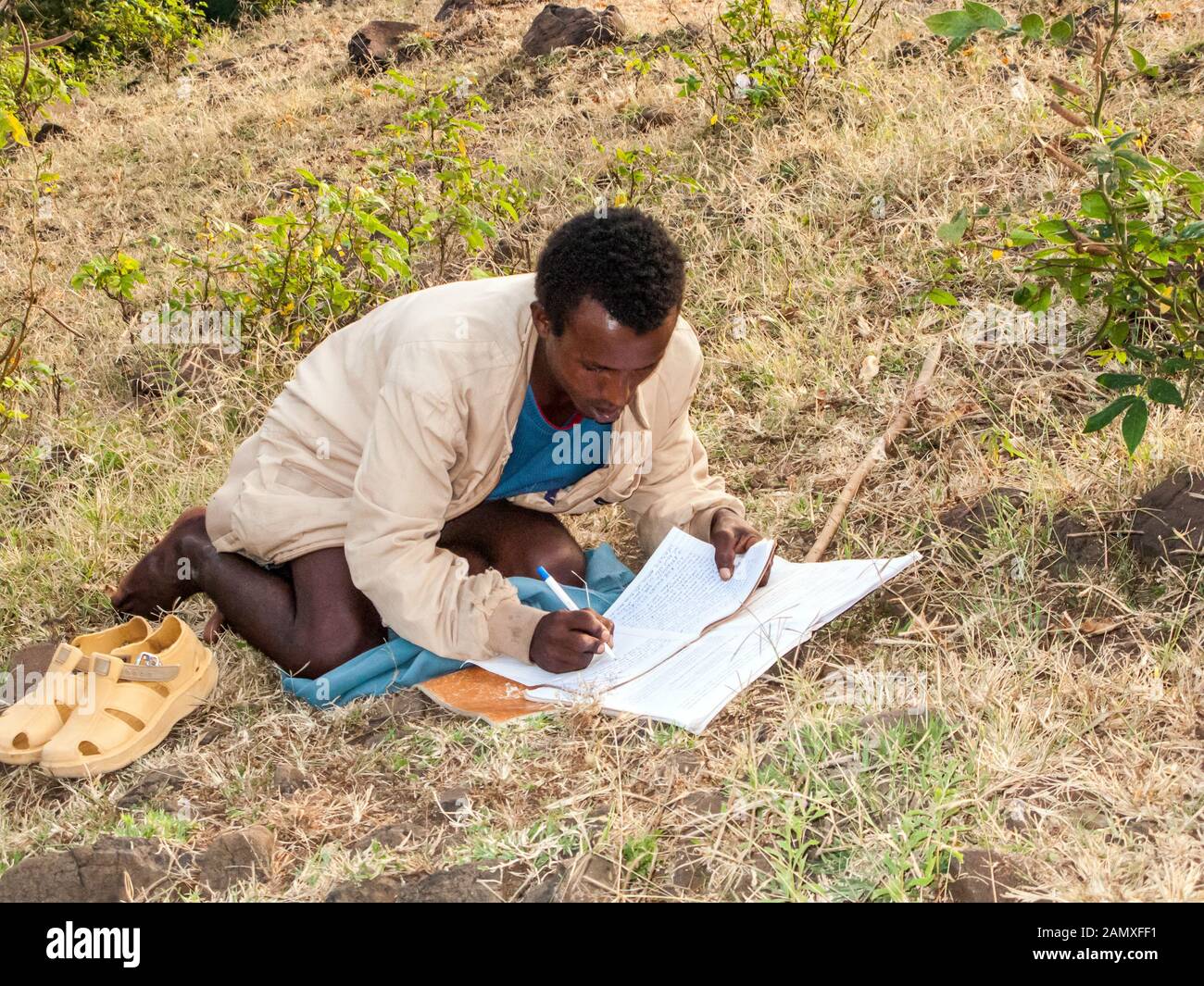 Ethiopian student takes notes,doing homework, Bahir Dar, Ethiopia Stock ...