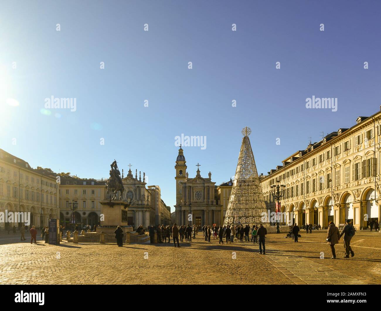 Piazza San Carlo square in the historic centre with people, tourists and the modern Christmas tree on a sunny Christmas day, Turin, Piedmont, Italy Stock Photo