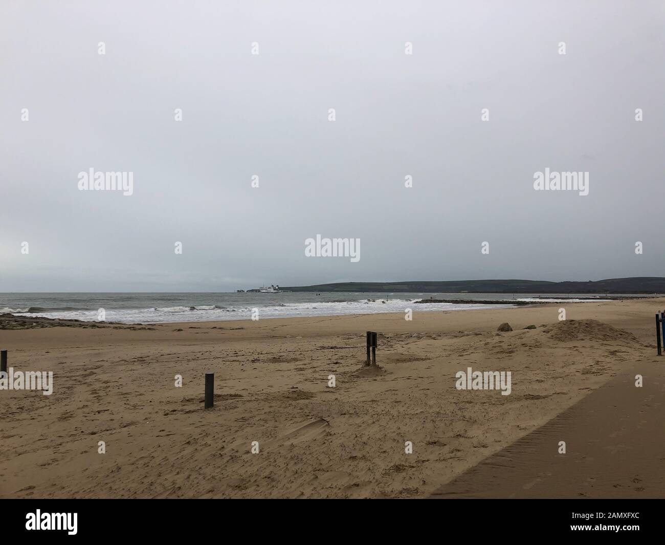 The blue flaged beach of Sandbanks, showing how the sea and rain during